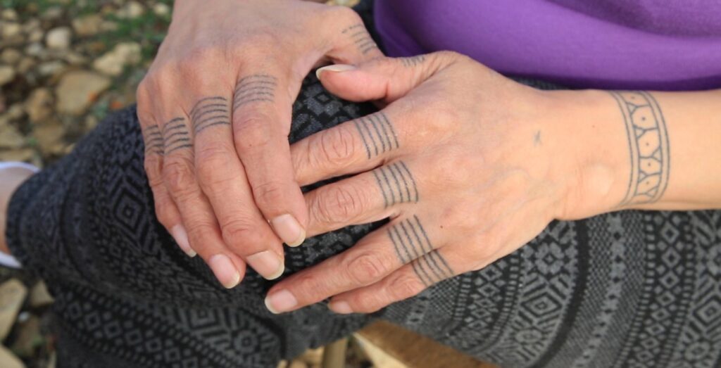 Nancy Angulalik hand tattos.2e16d0ba.fill 1370x700 c100
